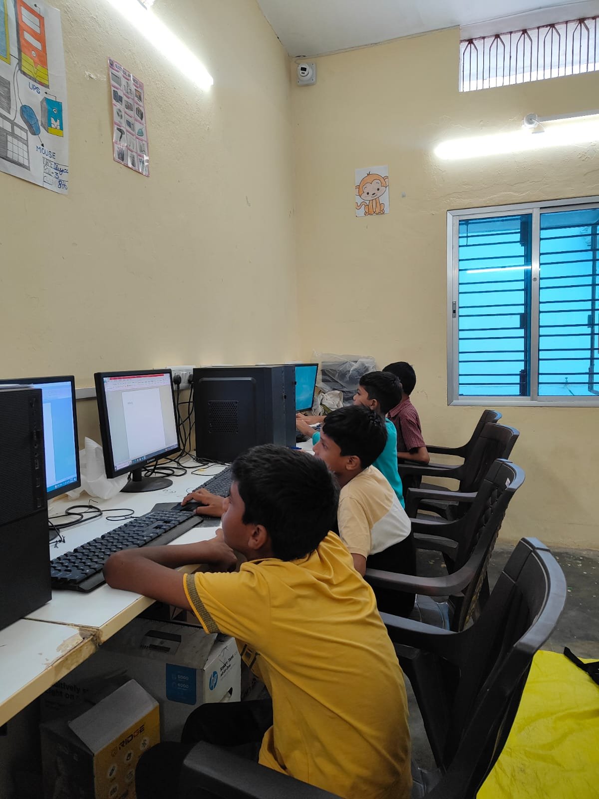 Students learning computer skills